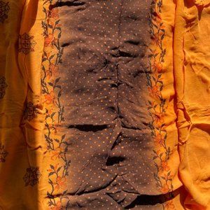 - Indian hand stitch fitted leggings like pants with embroidery near the ankles